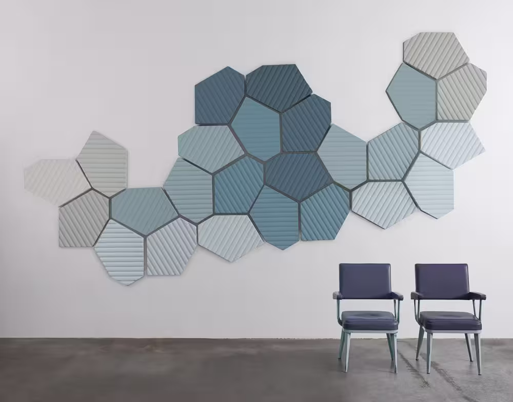 Geometric acoustic fabric panel detail — acoustic fabric covering and clean finish